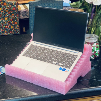 Pink electrostatic foam laptop stand