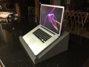 Fomatek Pro stand prototype shown with a 17" laptop